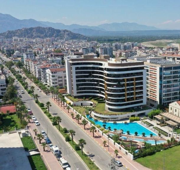 For Sale: Luxurious Four-Bedroom Beachfront Apartment in Konyaaltı, Antalya