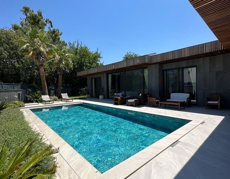 Stunning Seafront Villa for Sale in Bodrum: Luxury Living with Exceptional Rental Potential